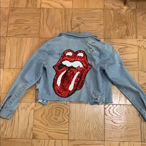 One of a kind ripped jean jacket